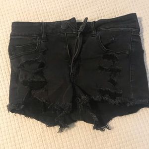 AE distressed black jean shorts